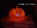 impression-3d-crane-squelette-citrouille-lampe-orange-led-vert-led-bleu.webp