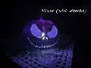 impression-3d-crane-squelette-citrouille-lampe-violet-led-blanc.webp