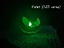 impression-3d-crane-squelette-citrouille-lampe-violet-led-vert.webp